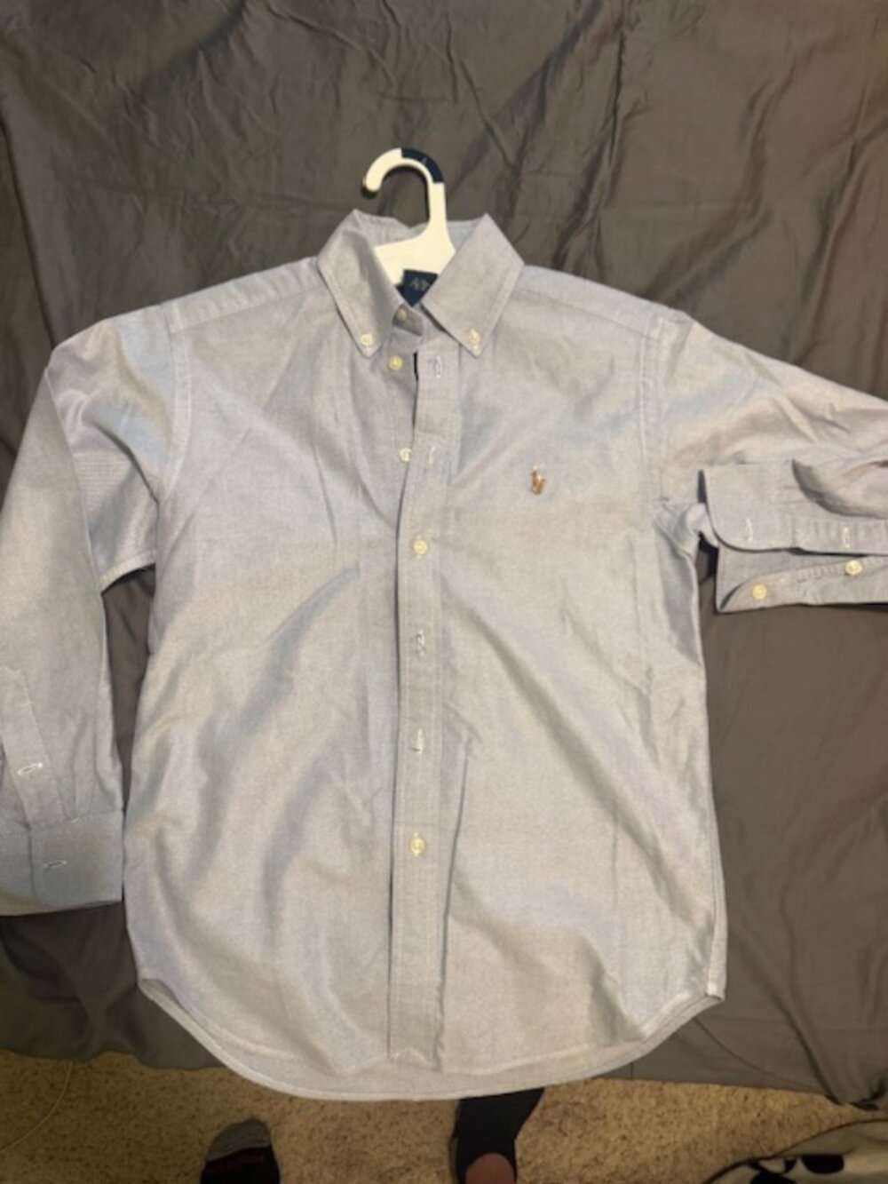 light blue polo shirt
